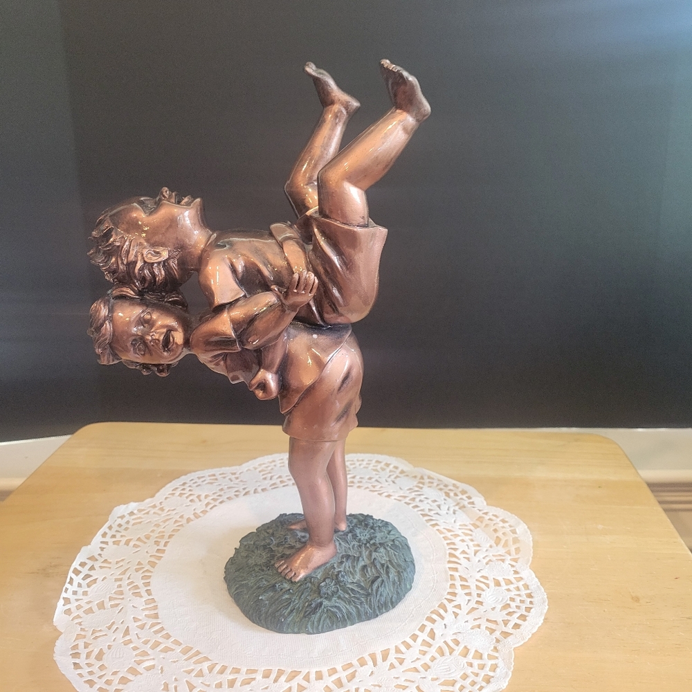Bronze-Toned Sculpture of Children